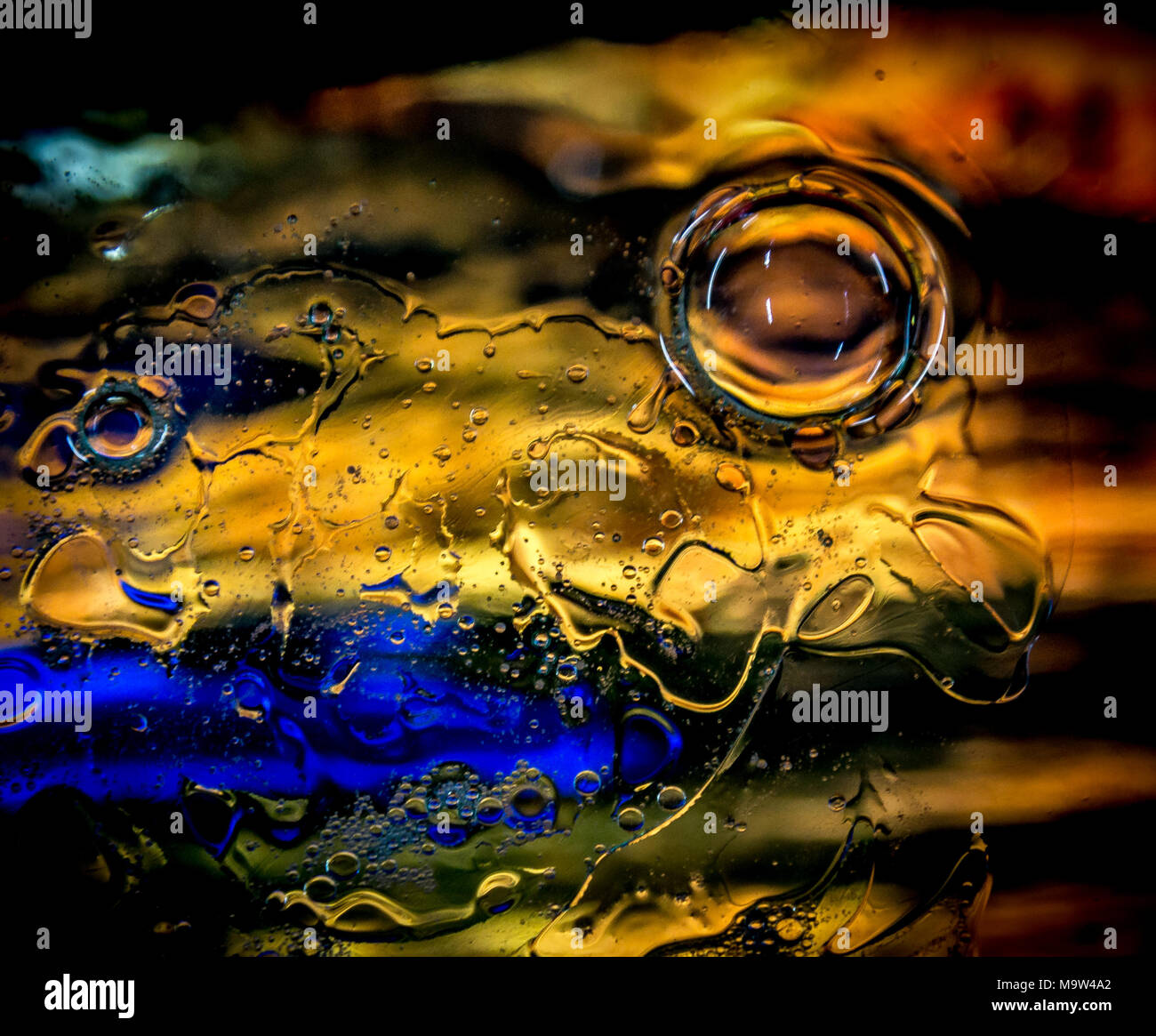 Psychedelic colours bubbles over coloured glass Stock Photo Alamy
