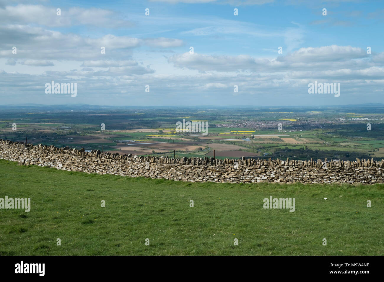 Spring dry stone wall view in countryside near Great Comberton at Bredon Hill in Worcestershire, England, United Kingdom. Stock Photo
