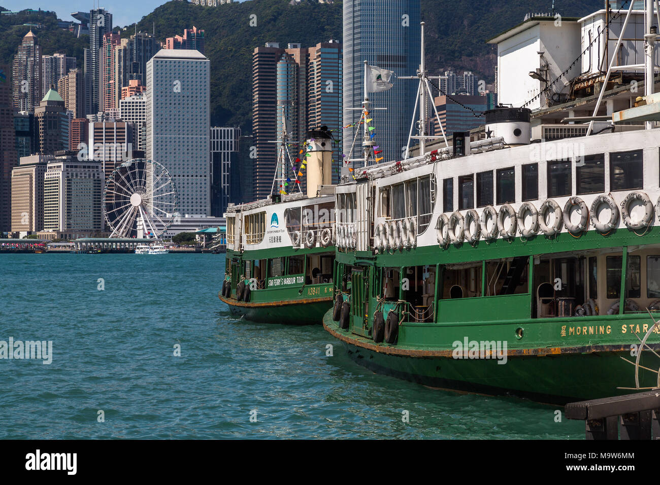 Star Ferry Pier, Victoria Harbour with the skyscrapers of Hong Kong Island in the background. Stock Photo