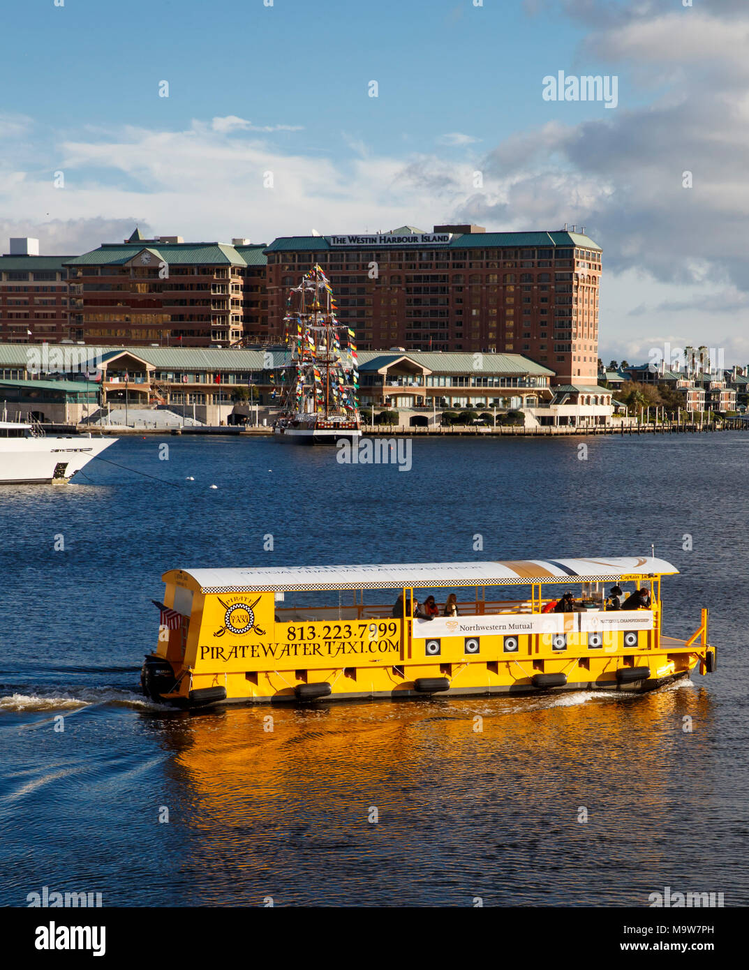 The Pirate Water Taxi navigates the Hillsborough River in front of the Tampa Convention Center during the 2017 College Football Playoff in Tampa, Flor Stock Photo