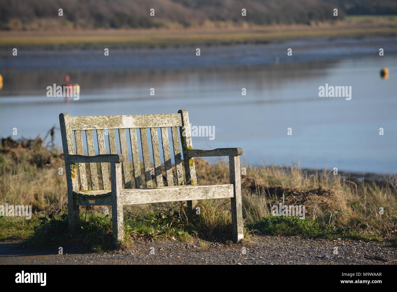 wooden bench at Cobnor Point, Chichester Harbour Stock Photo