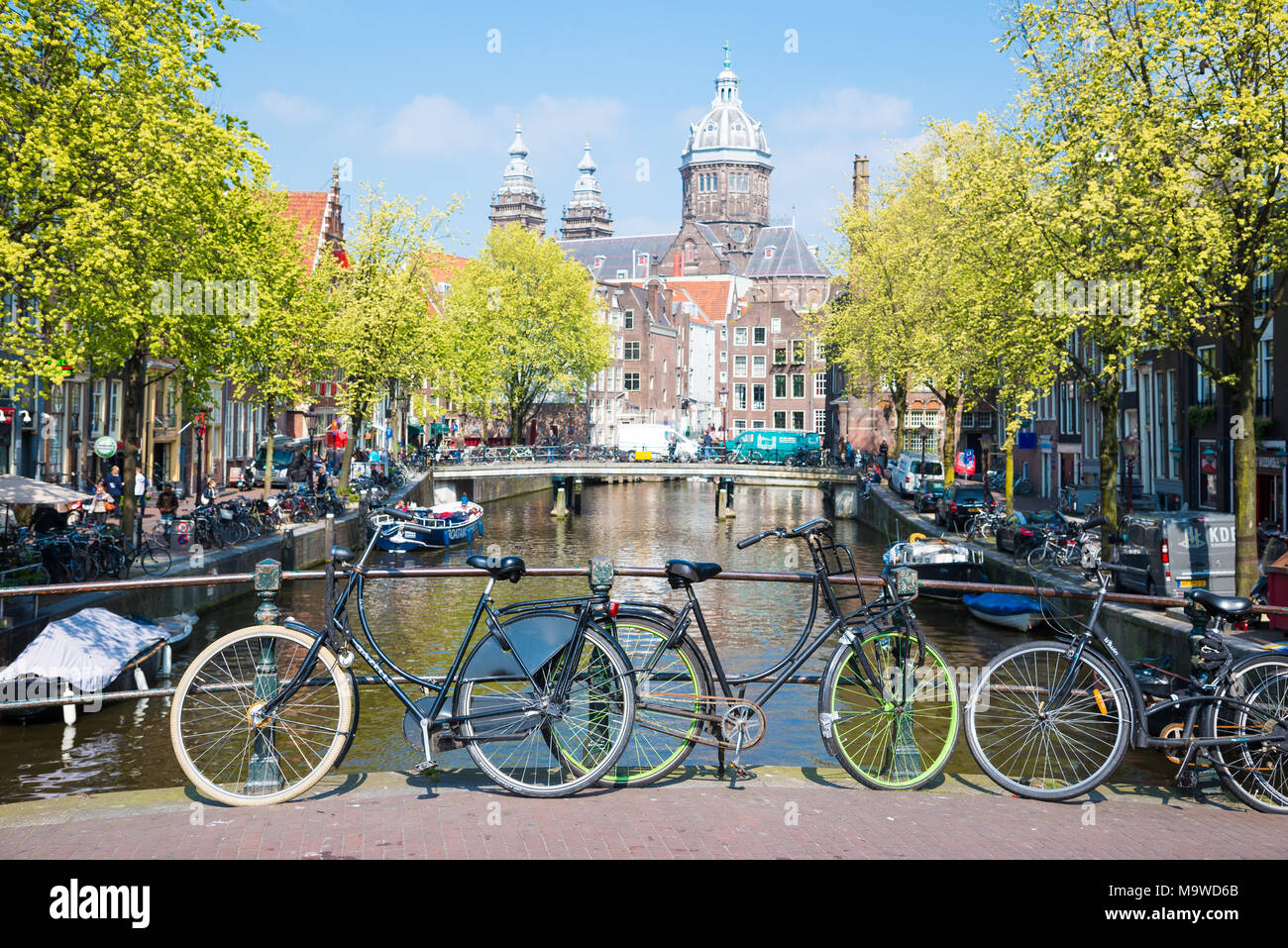 Amsterdam, Netherlands - April 20, 2017: Bicycles parked on a bridge in Amsterdam, The Netherlands Stock Photo