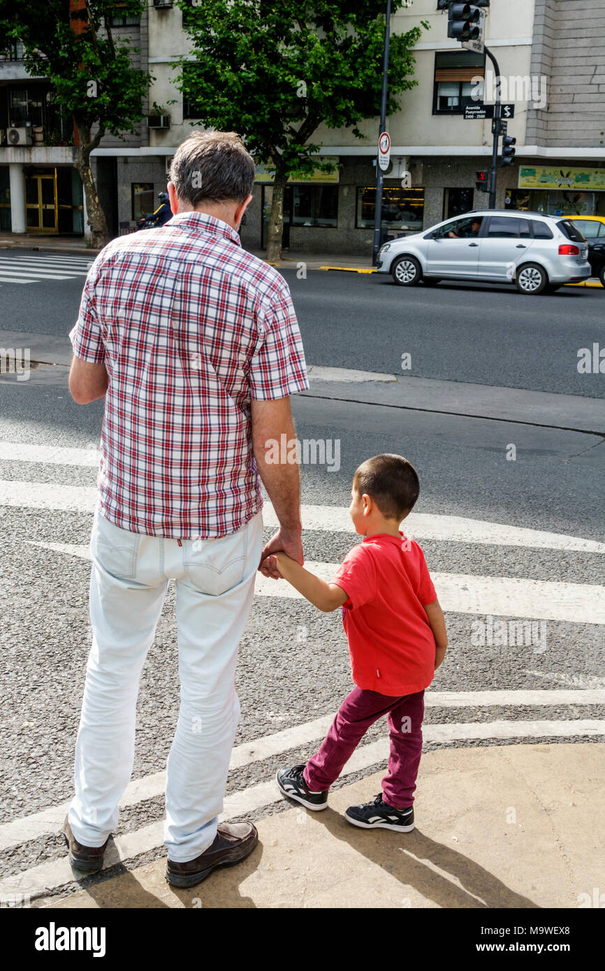 Buenos Aires Argentina,Recoleta,intersection,street crossing,adult adults man men male,boy boys,kid kids child children youngster youngsters youth you Stock Photo