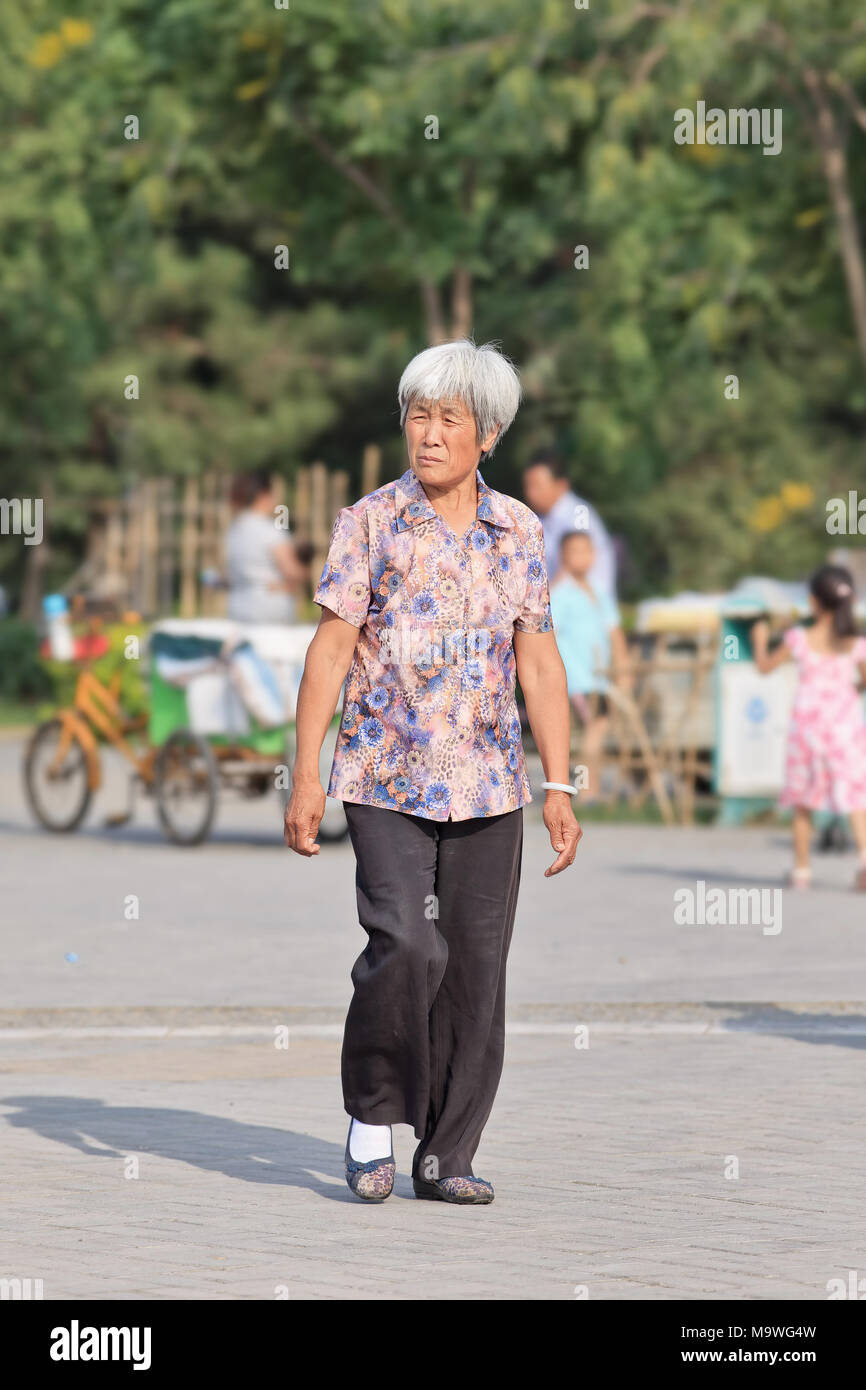 Elderly park asian walk hi-res stock photography and images - Alamy