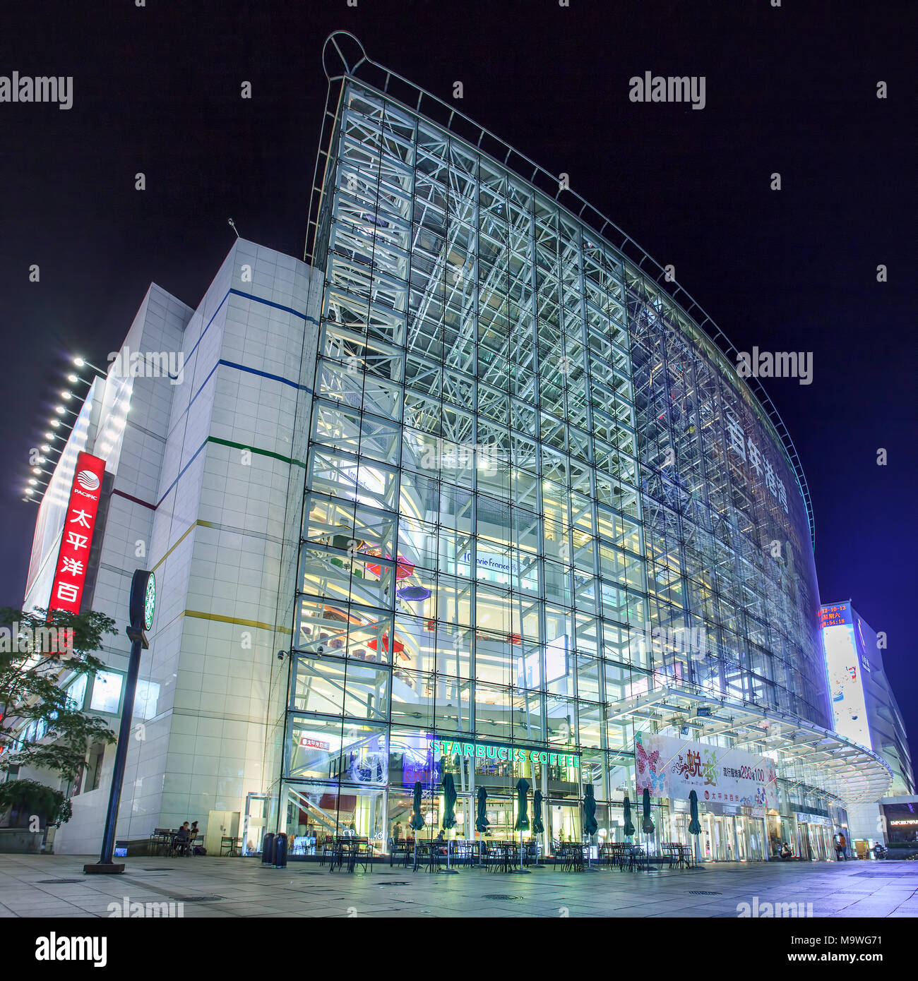 DALIAN-CHINA-OCT. 13, 2014. Shopping mall night. Combined sales of top 20 developers in terms of annual contracted sales hit 2.979 trillion yuan. Stock Photo