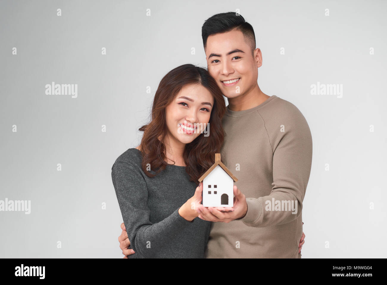 Happy young asian couple with new home concept Stock Photo - Alamy