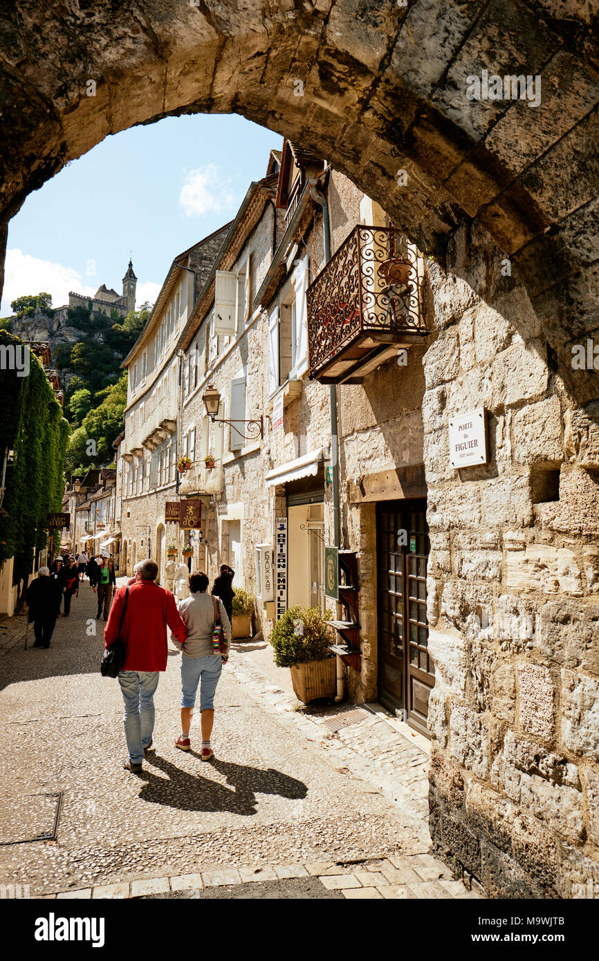 The pedestrianised street and shops of Rocamadour a vertical clifftop village in Lot south-central France. Stock Photo