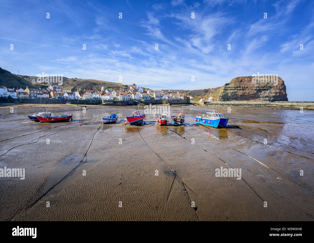 Beach and boats at Staithes picturesque fishing village on the North Yorkshire Coast in the North York Moors National Park Stock Photo