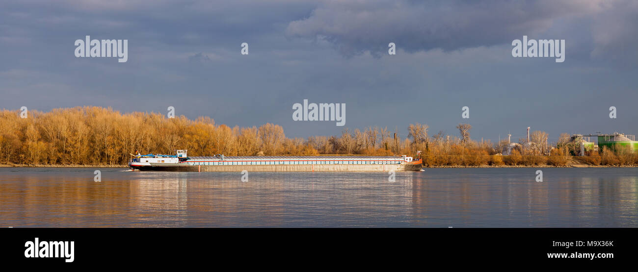 Self-propelled scow on the river Danube. Stock Photo