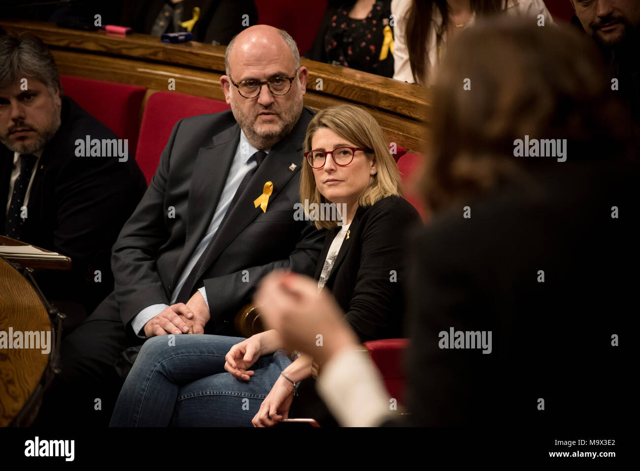 Barcelona, Catalonia, Spain. 28th Mar, 2018. Junts per Catalunya (JxCAT) members of parliament Eduard Pujol (L) and Elsa Artadi (R) during a parliament session.The independentist parties of the Catalan parliament vindicate the right of Carles Puigdemont to be invested as Catalonia president. Carles Puigdemont is being held by the German authorities after been arrested on an international warrant. Credit: Jordi Boixareu/ZUMA Wire/Alamy Live News Stock Photo