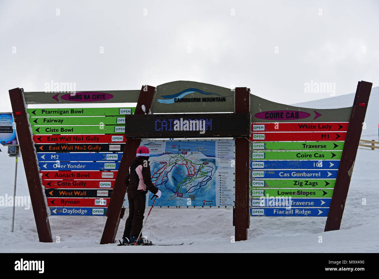 Aviemore, Scotland, United Kingdom, 28, March, 2018. A skier studies a piste map at Cairngorm Mountain ski centre as the Easter holidays get under way, © Ken Jack / Alamy Live News Stock Photo