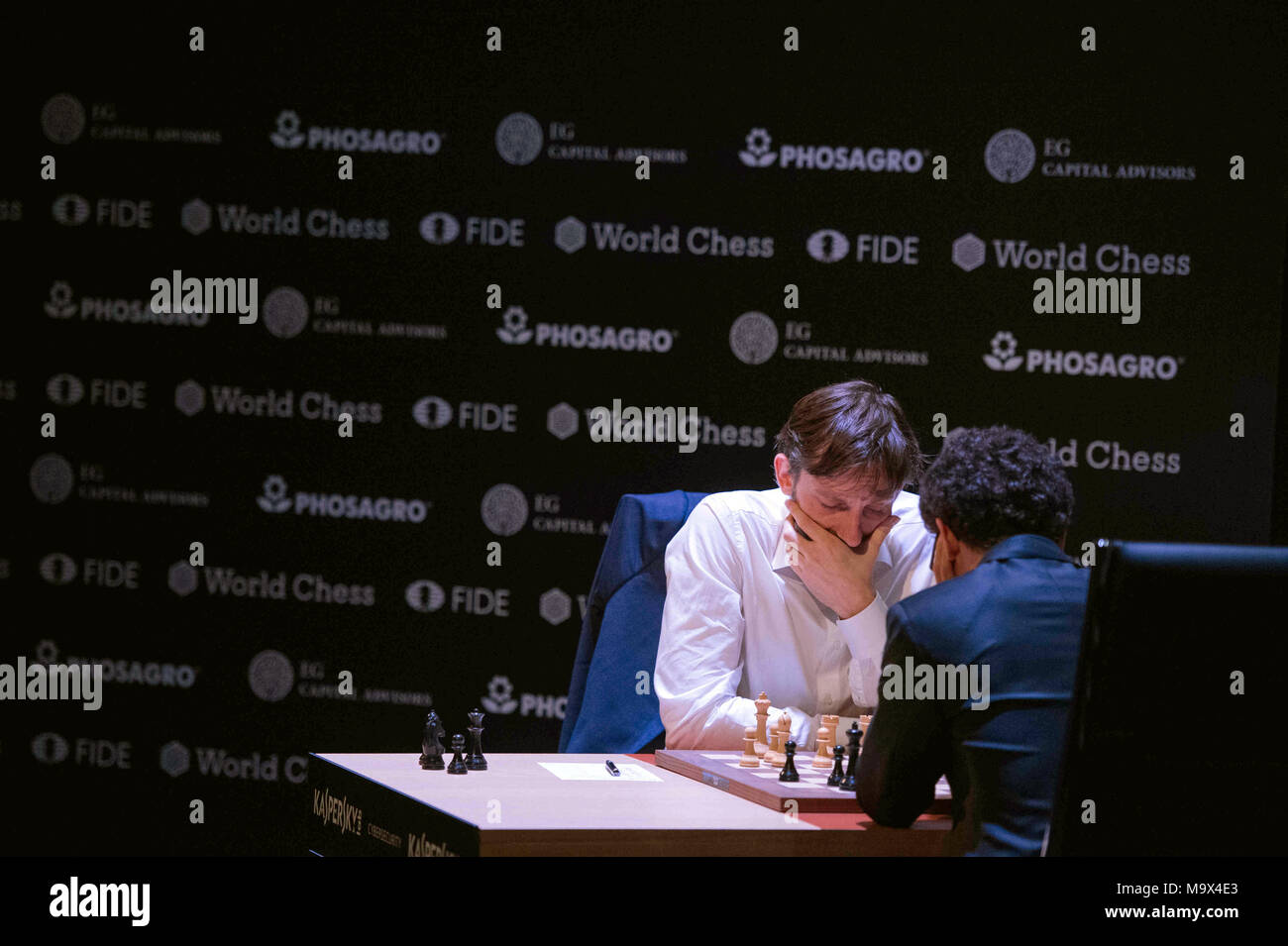 22 March 2018, Germany, Berlin: Italian-American chess champion Fabiano  Caruana competes against Shakhriyar Mamedyarov (not shown), a chess  champion from Azerbaijan, at this year's FIDE World Chess Candidates  Tournament at the Kuehlhaus