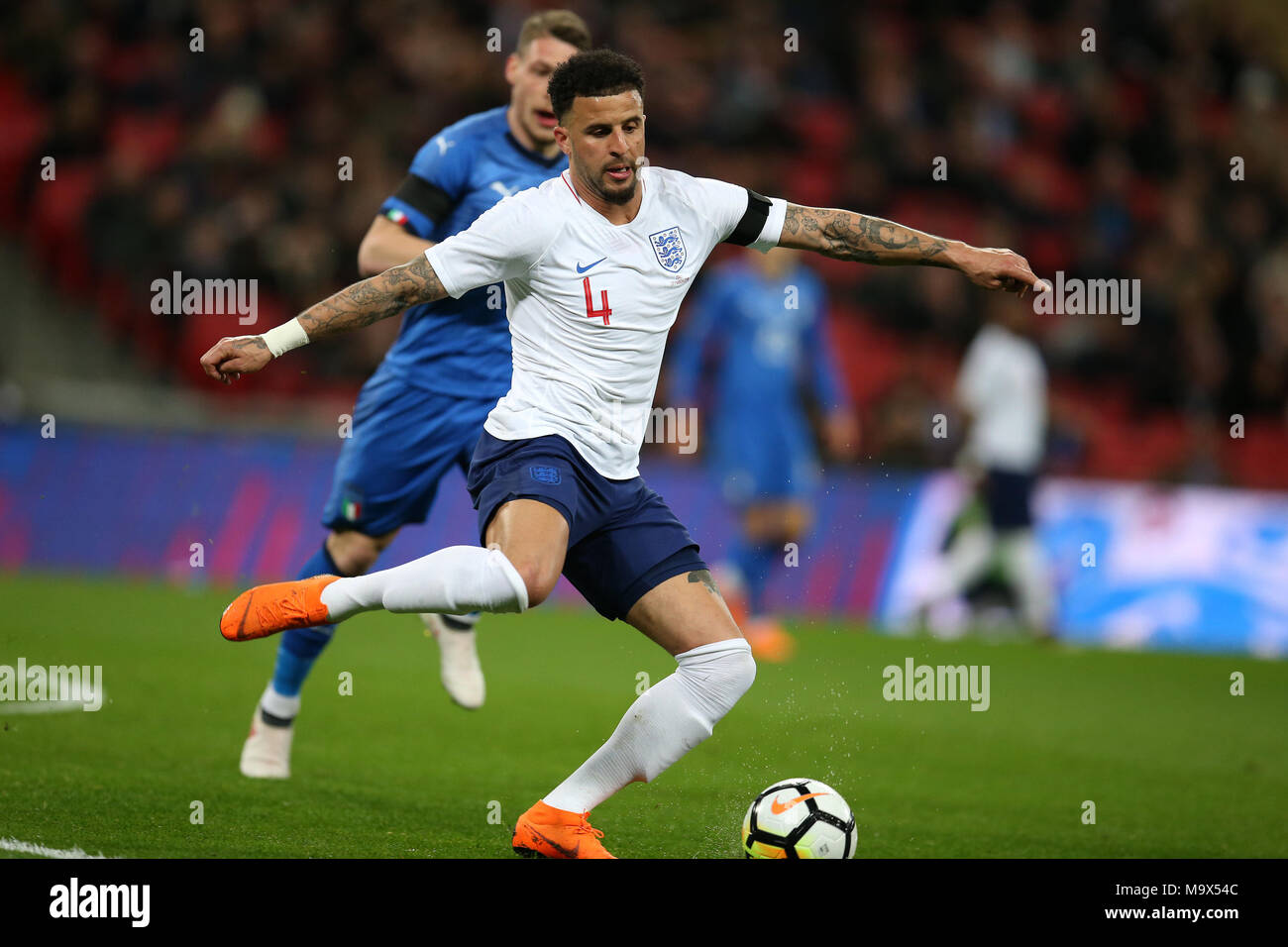 London, UK. 27th March 2018. Kyle Walker of England in action. Football International friendly, England v Italy at Wembley Stadium in London on Tuesday 27th March 2018.  Editorial Use Only pic by Andrew Orchard/Alamy Live news Stock Photo