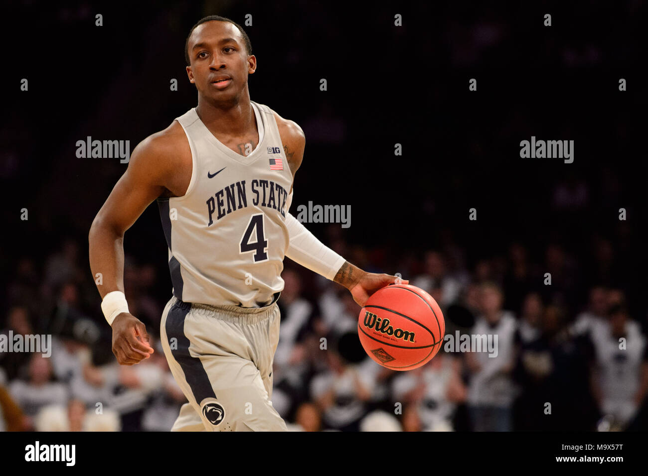 March 27, 2018: Penn State Nittany Lions guard Nazeer Bostick (4) handles the ball at the semi-final of the NIT Tournament game between The Penn State Nittany Lions and The Mississippi State Bulldogs at Madison Square Garden, New York, New York. Mandatory credit: Kostas Lymperopoulos/CSM Stock Photo