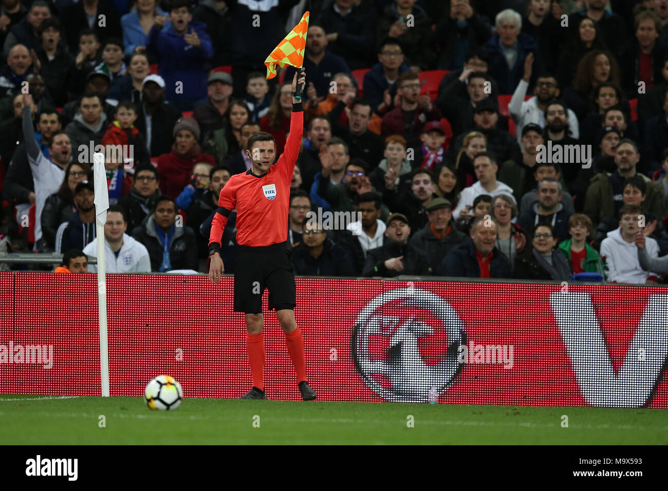 the assistant referee waves his flag. Football International friendly, England v Italy at Wembley Stadium in London on Tuesday 27th March 2018.  Editorial Use Only pic by Andrew Orchard/Alamy Live news Stock Photo