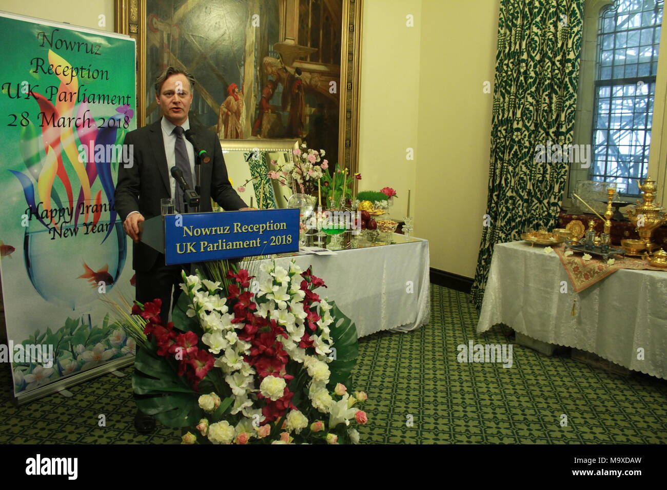 London, UK. 28th Mar, 2018. Dr Matthew Offord MP, London, UK, 28/03/2018 - Cross-party MPs & Peers joined members of the Anglo-Iranian community for Nowruz celebration in the UK Parliament on Wednesday 28 March 2018. Matthew Offord MP speaking at this event and said, the popular protests that have targeted the theocracy in its entirety is the beginning of a new era for the Iranian nation and a clear sign that the Iranian people desire genuine democratic change in their country in the coming Persian New Year. Credit: Siavosh Hosseini/Alamy Live News Stock Photo