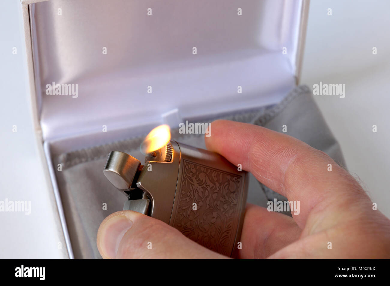 Gas gift lighter with original stylish drawing Stock Photo Alamy