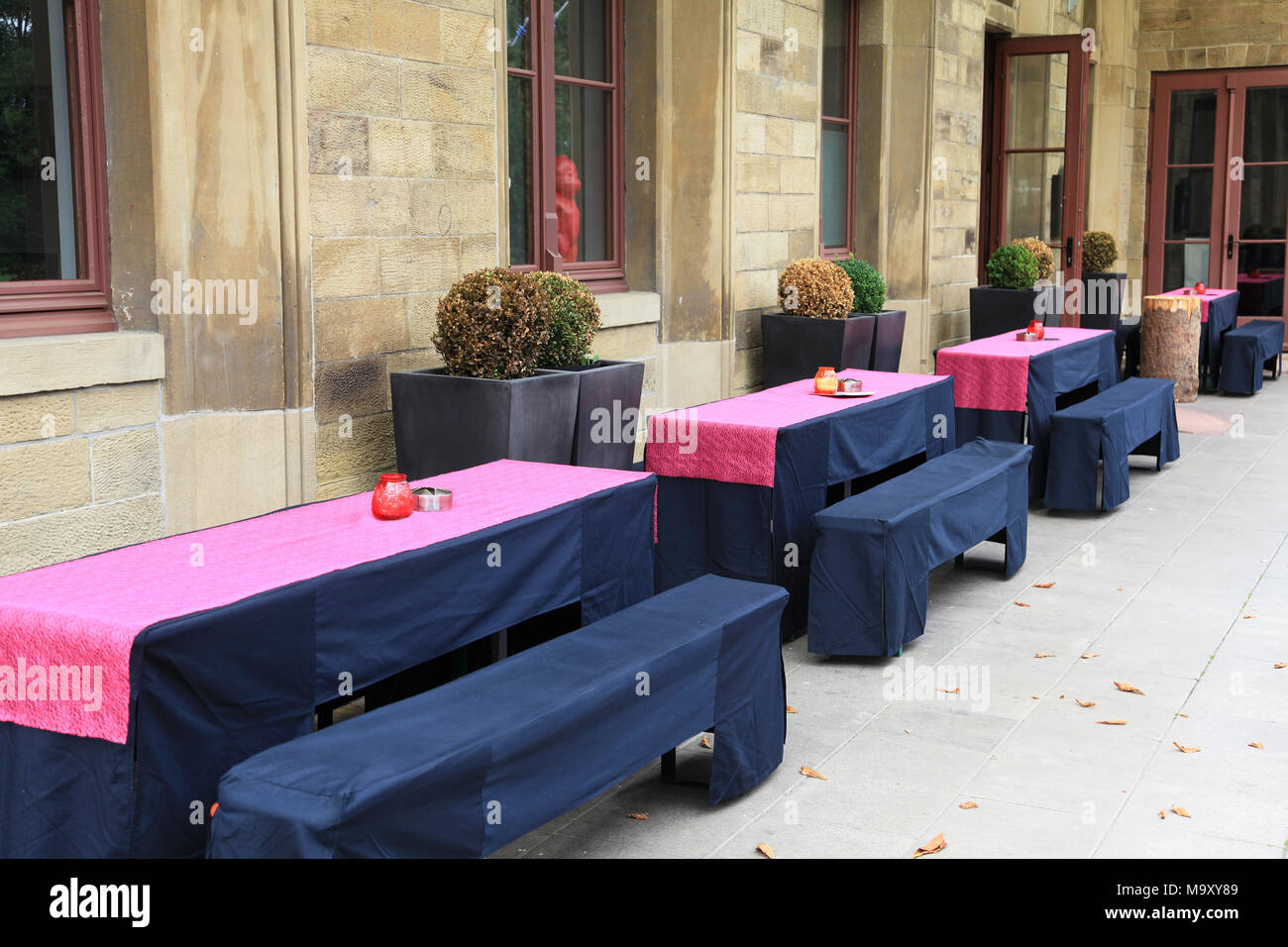 Outdoor furniture tables and benches Stock Photo