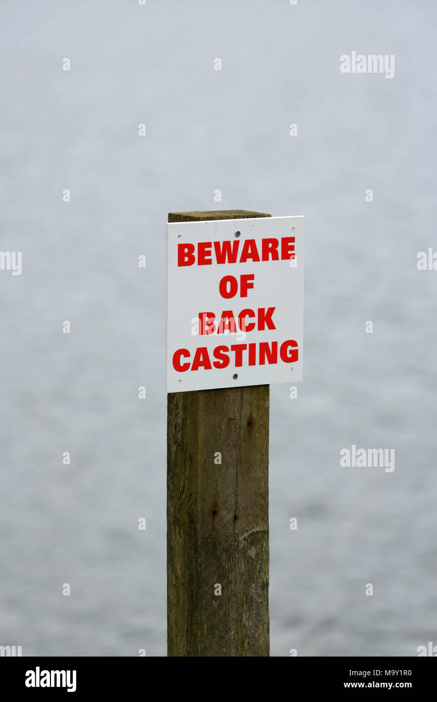 Sign warning of anglers back cast at Trimpley reservoir , near Bewdley, Worcestershire, uk. Stock Photo