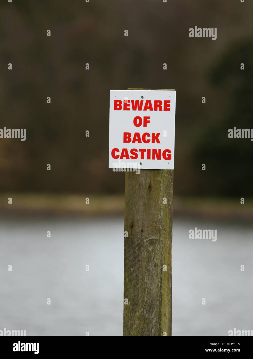 Sign warning of anglers back cast at Trimpley reservoir , near Bewdley, Worcestershire, uk. Stock Photo