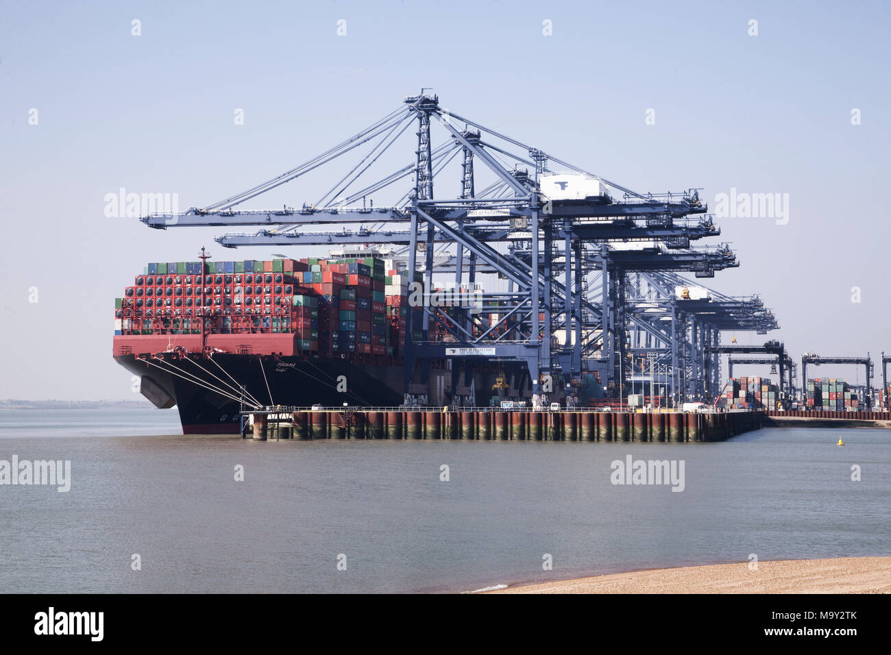 Ships and Boats docking, unloading and loading in ports Stock Photo