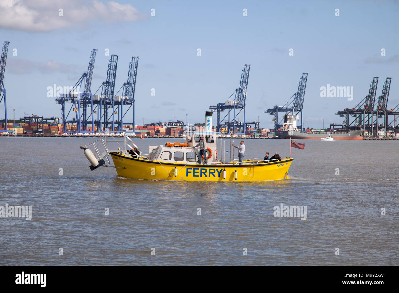 Ships and Boats docking, unloading and loading in ports Stock Photo