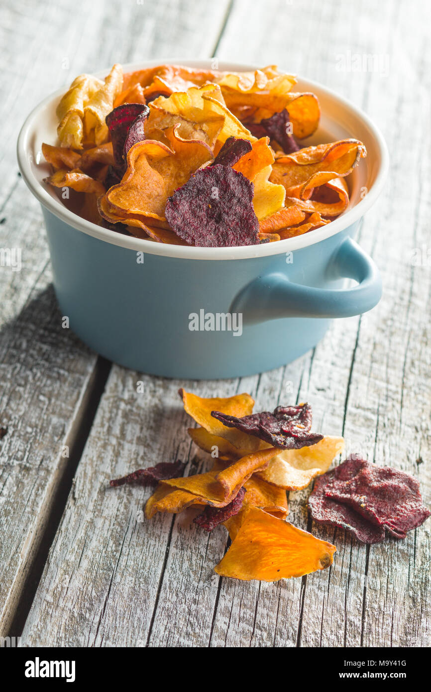 Mixed fried vegetable chips in pot. Stock Photo
