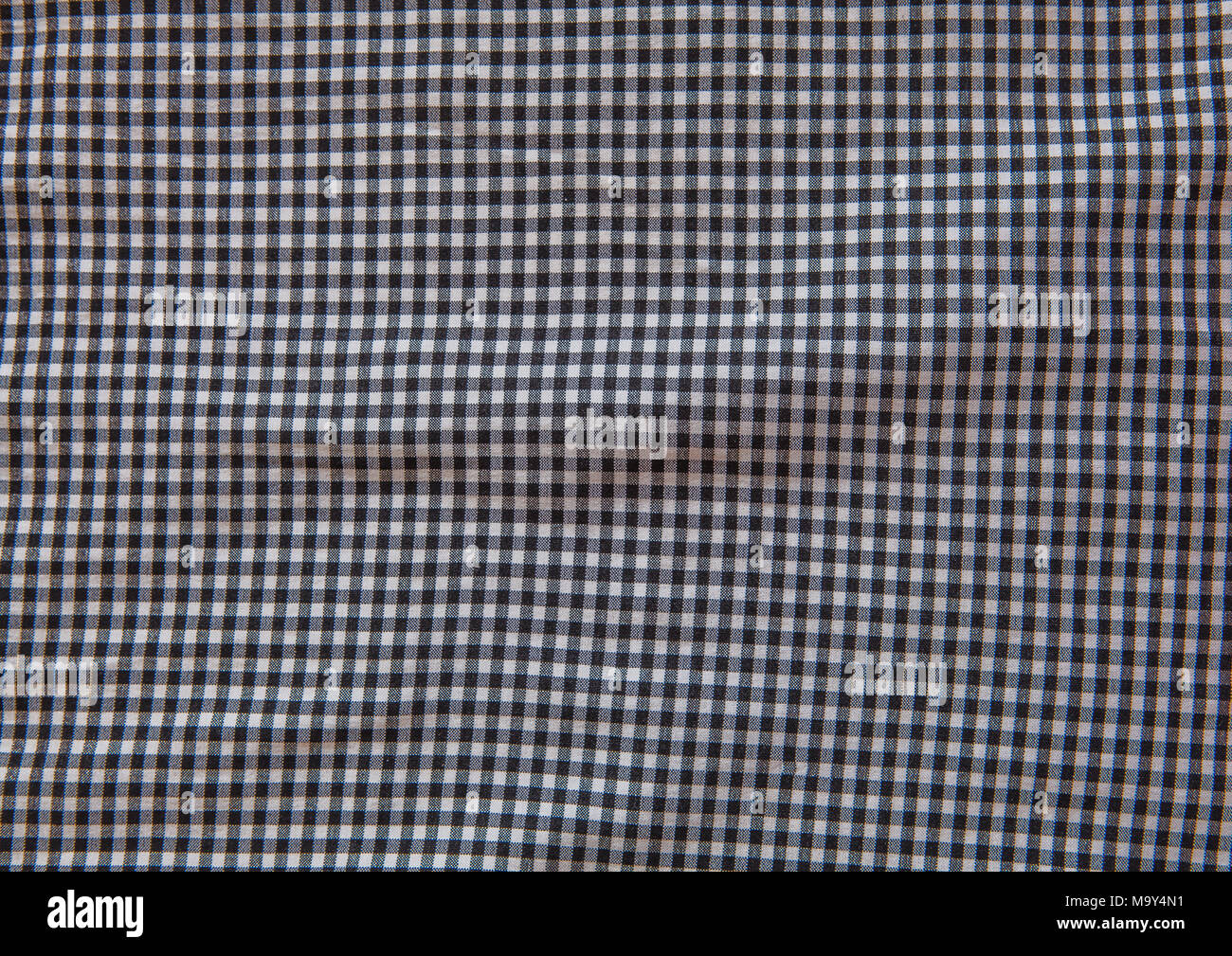 Grey and white checkered fabric texture background Stock Photo Alamy