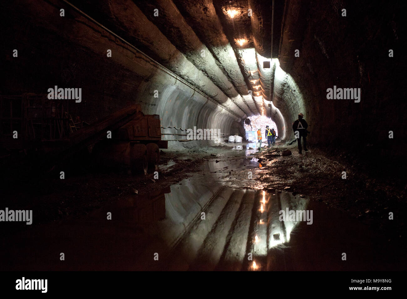 Employees of Technicore Underground construct an underlake pedestrian
