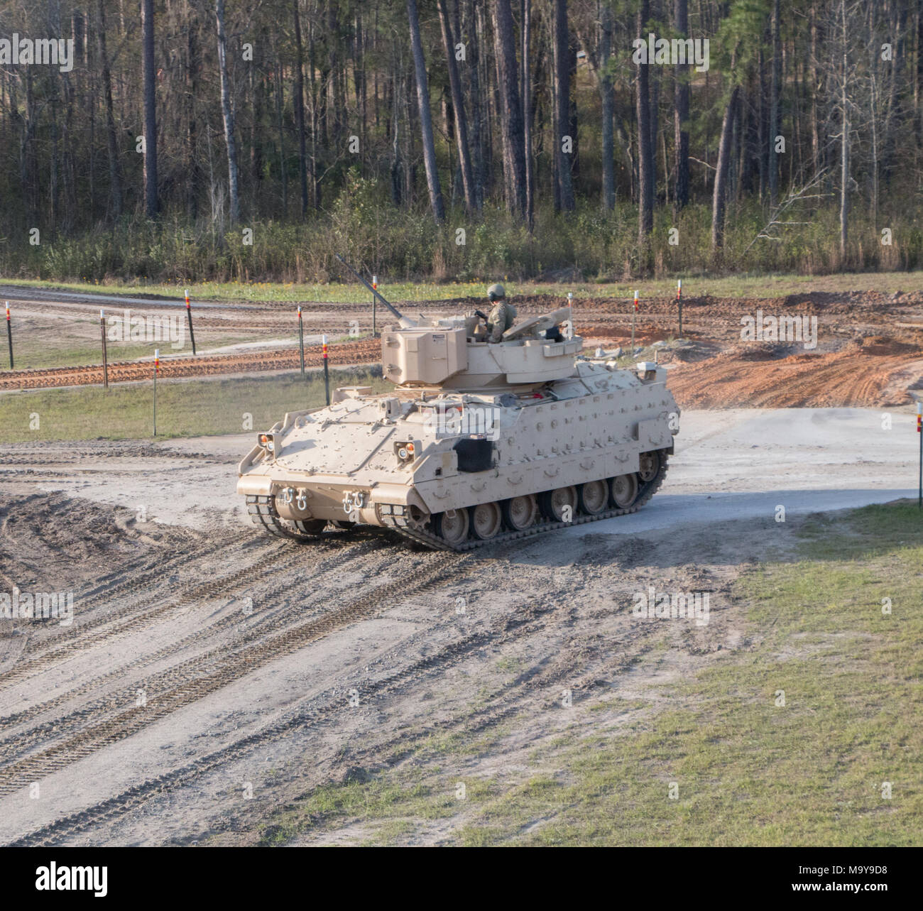 Troopers of 6th Squadron, 8th Cavalry Regiment, 2nd Armored Brigade Combat Team, 3rd Infantry Division, prepare to send a live round down range March 21 at Fort Stewart, Ga. This is the first time live rounds have been fired since the U.S. Army announced that 3rd ID’s Spartan Brigade would convert from an infantry to an armored brigade combat team. (U.S. Army photo taken by Spc. Calab Franklin/Released) Stock Photo