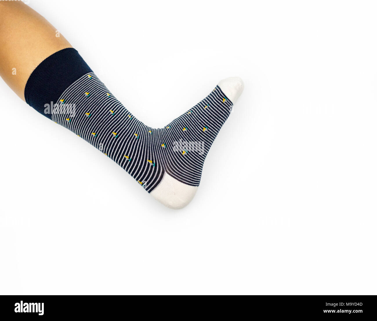 Sock on leg, leg wearing sock one side on white background Stock Photo