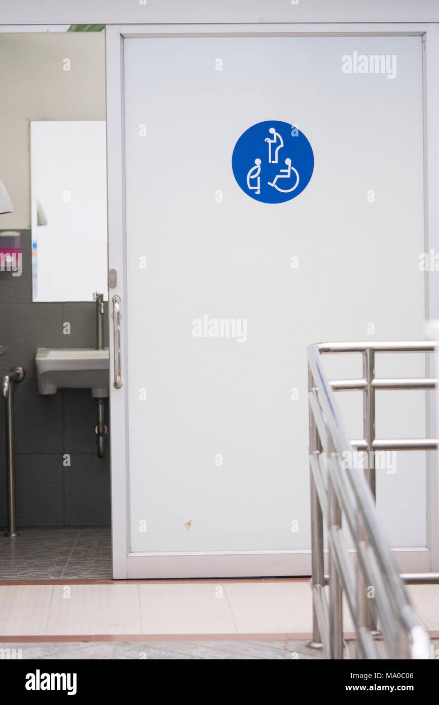 Entrance door to the Public toilet for disabled people, pregnant women, old  people, Toilet sign on door Stock Photo - Alamy