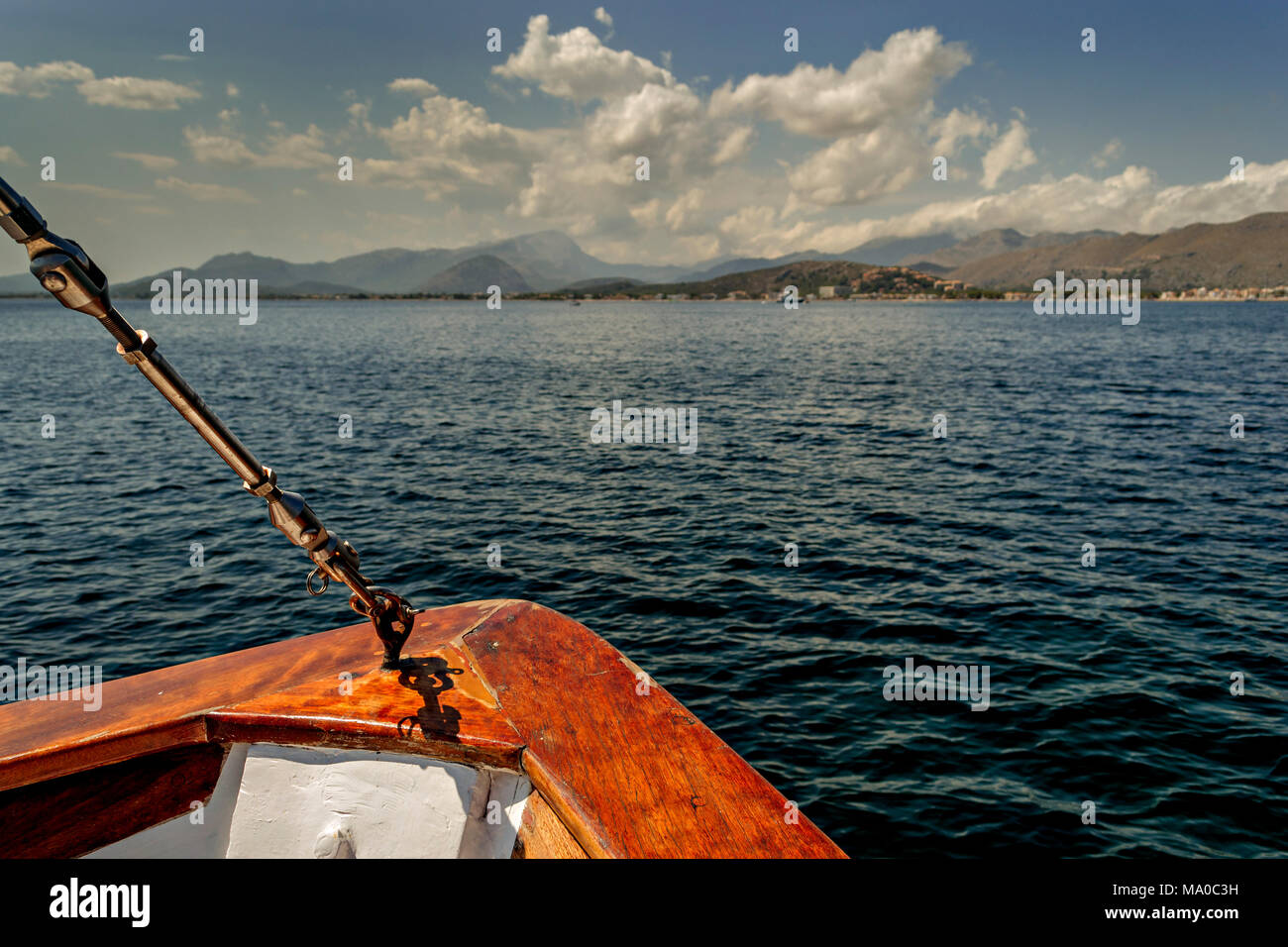Wooden prow of a small boat in the Mediterranean sea off Pollenca, Mallorca Stock Photo