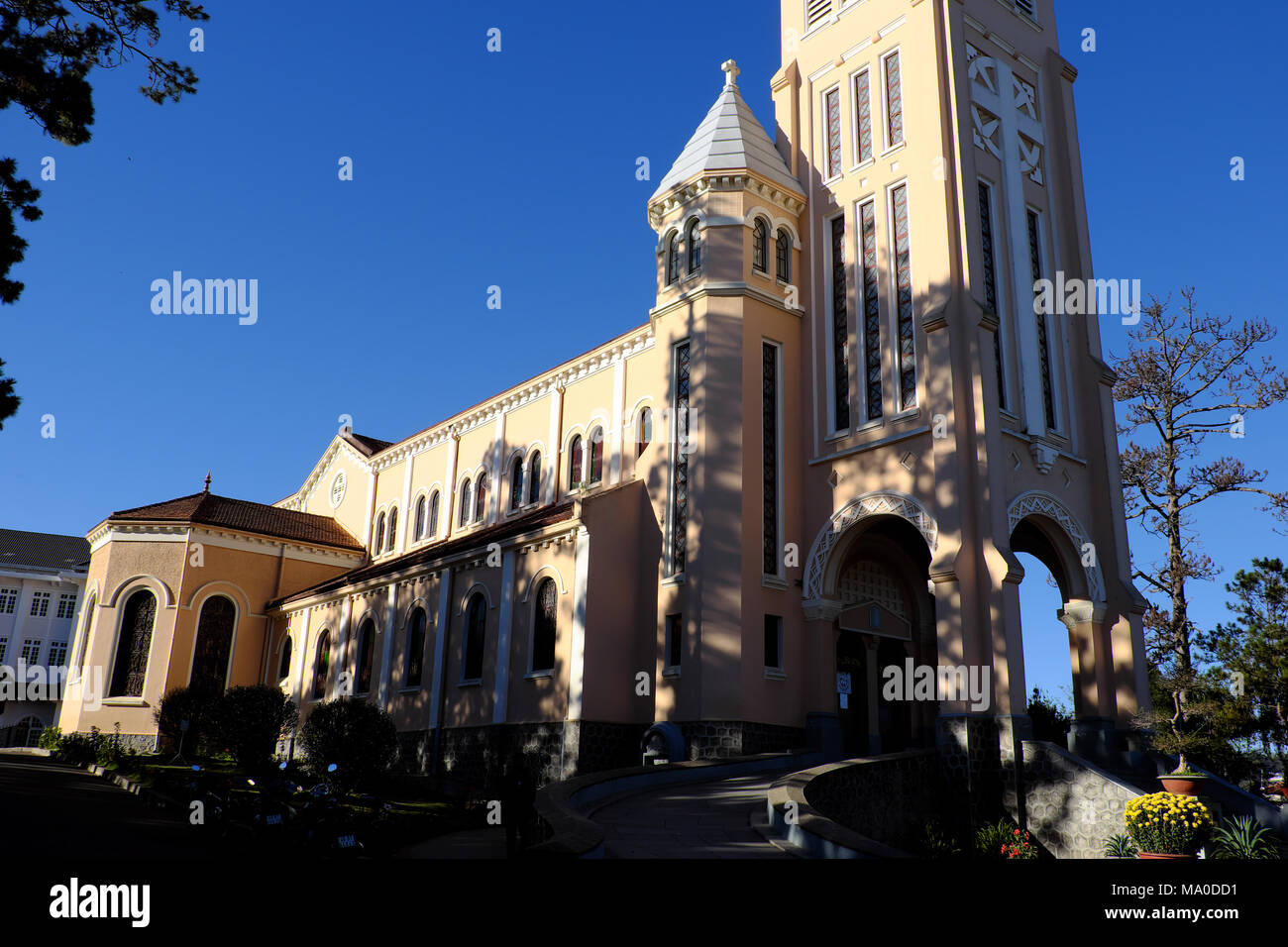 Da Lat Cathedral, an ancient architectural works, French classical architectural style, chicken Church Dalat with statue of rooster on top bell tower Stock Photo