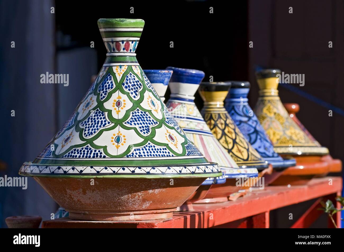 Colorful tagine souvenirs for sale in a shop in Morocco. Stock Photo