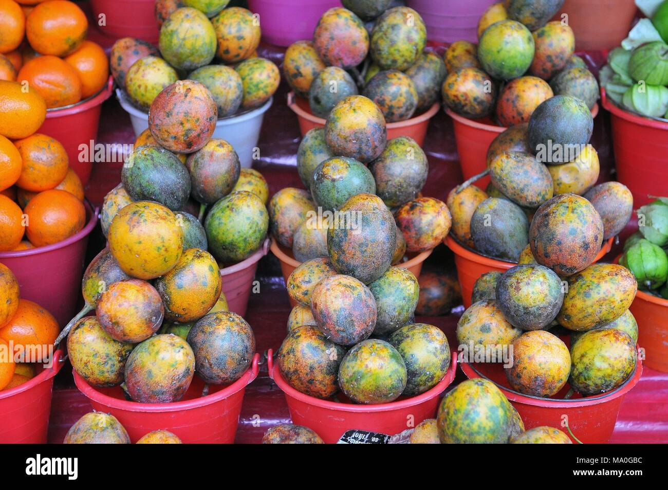 Passion fruit at the local market in San Cristobal de las Casas, Chiapas, Mexico. Stock Photo