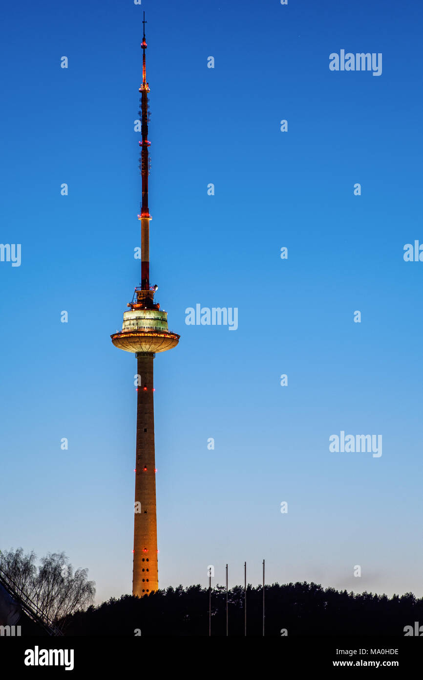 Vilnius TV Tower -- the tallest structure in Lithuania -- at night on the  clear blue sky background Stock Photo - Alamy