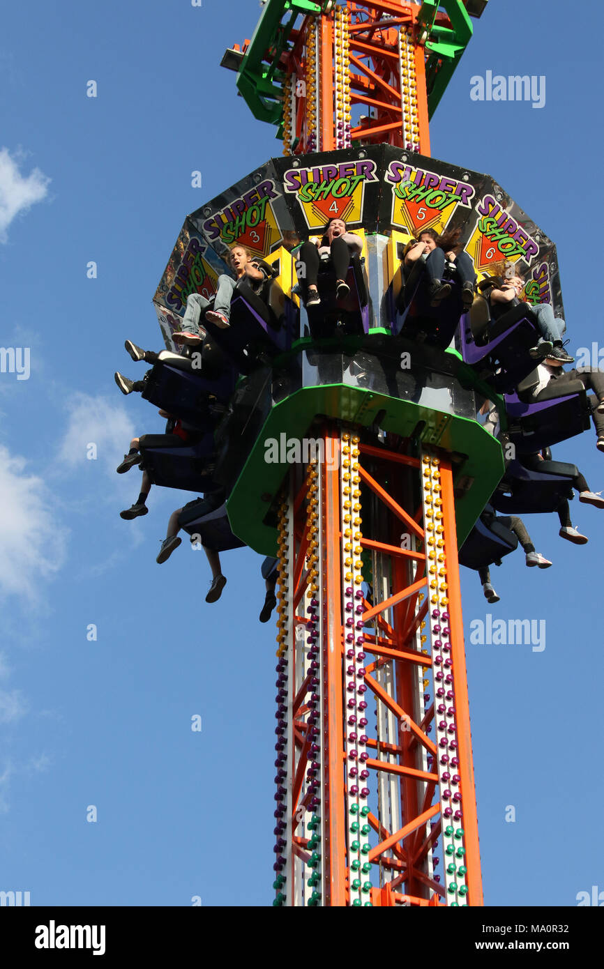 Riders on the Super Shot drop tower amusement ride. Canfield Fair. Mahoning County Fair. Canfield, Youngstown, Ohio, USA. Stock Photo