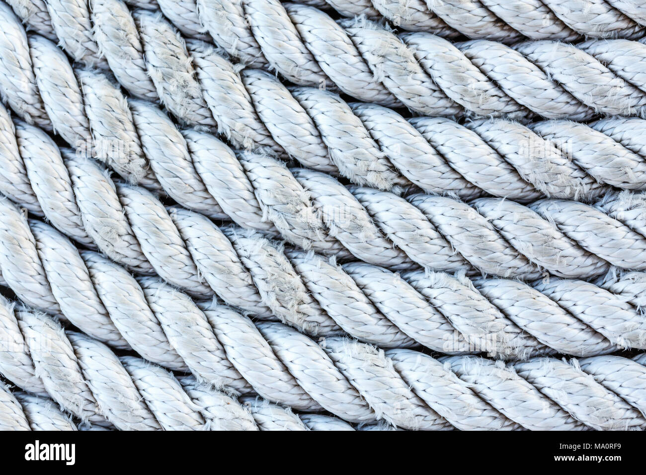 Rope folded into a spiral Stock Photo - Alamy