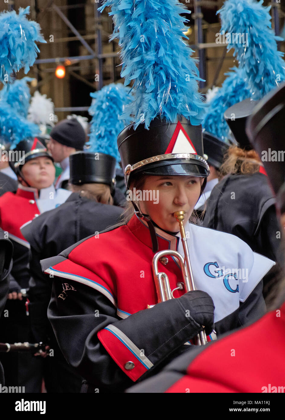 Girl holding trumpet in St. Patrick's Day Parade in New York, 2018