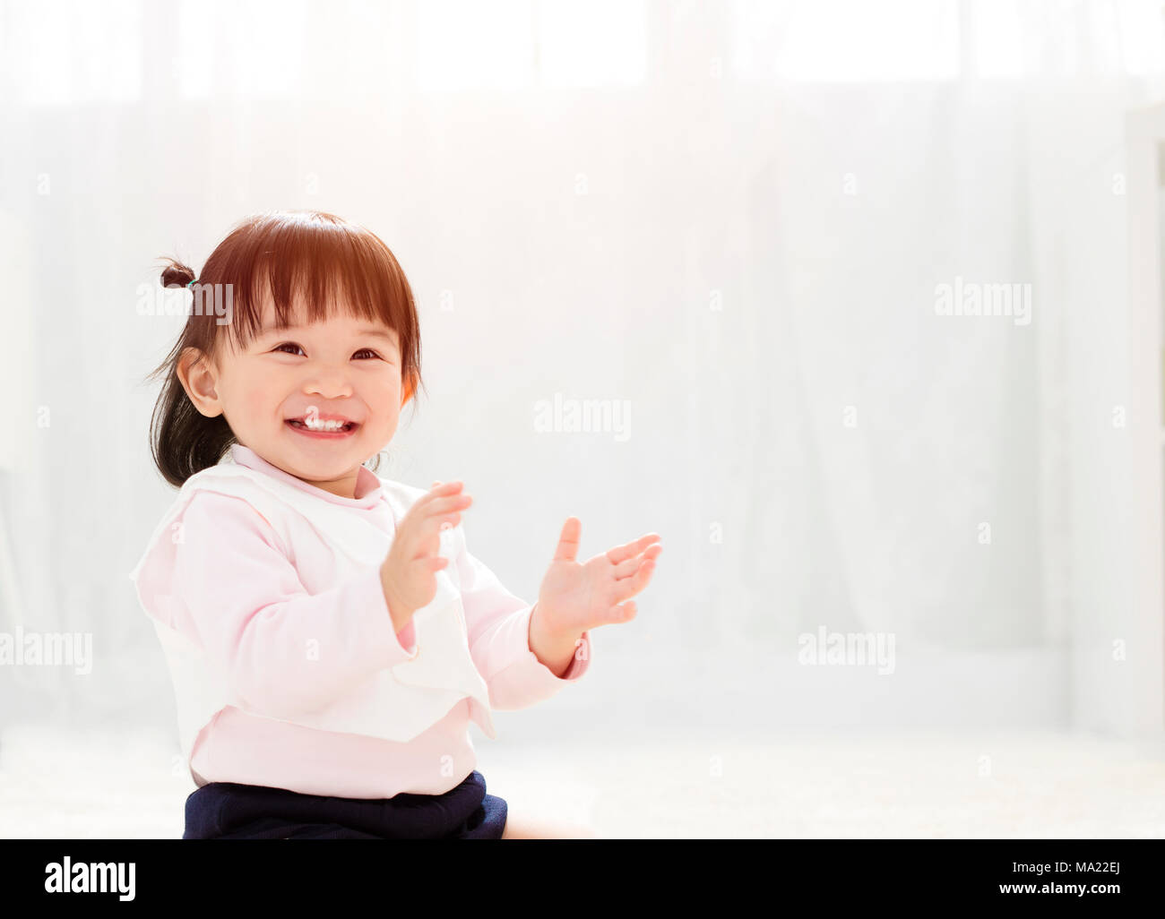 closeup happy little girl face Stock Photo