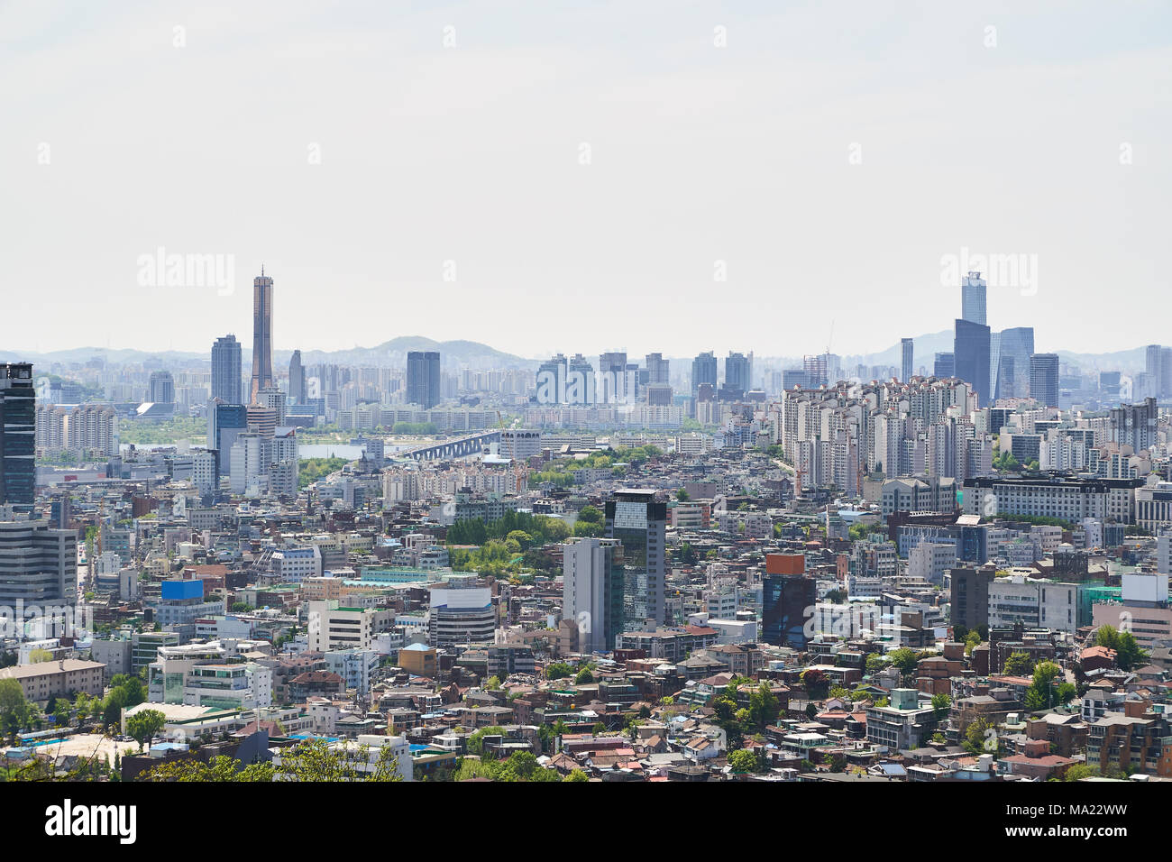 Cityscape of Yongsan-gu and Mapo-gu with Wonhyo bridge and Yeoui-do island in Seoul, Korea. The view is from N tower in Namsan Mountain. Stock Photo