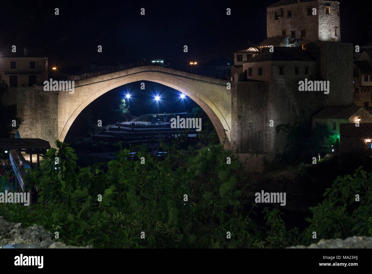 MOSTAR, BOSNIA-HERZEGOVINA - AUGUSt 16 2017: Night view of the famous bridge of Mostar Stock Photo