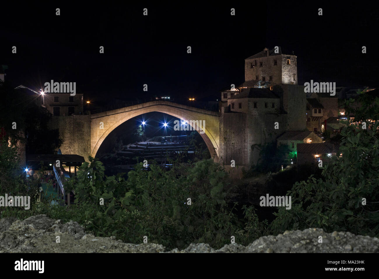 MOSTAR, BOSNIA-HERZEGOVINA - AUGUSt 16 2017: Night view of the famous bridge of Mostar Stock Photo