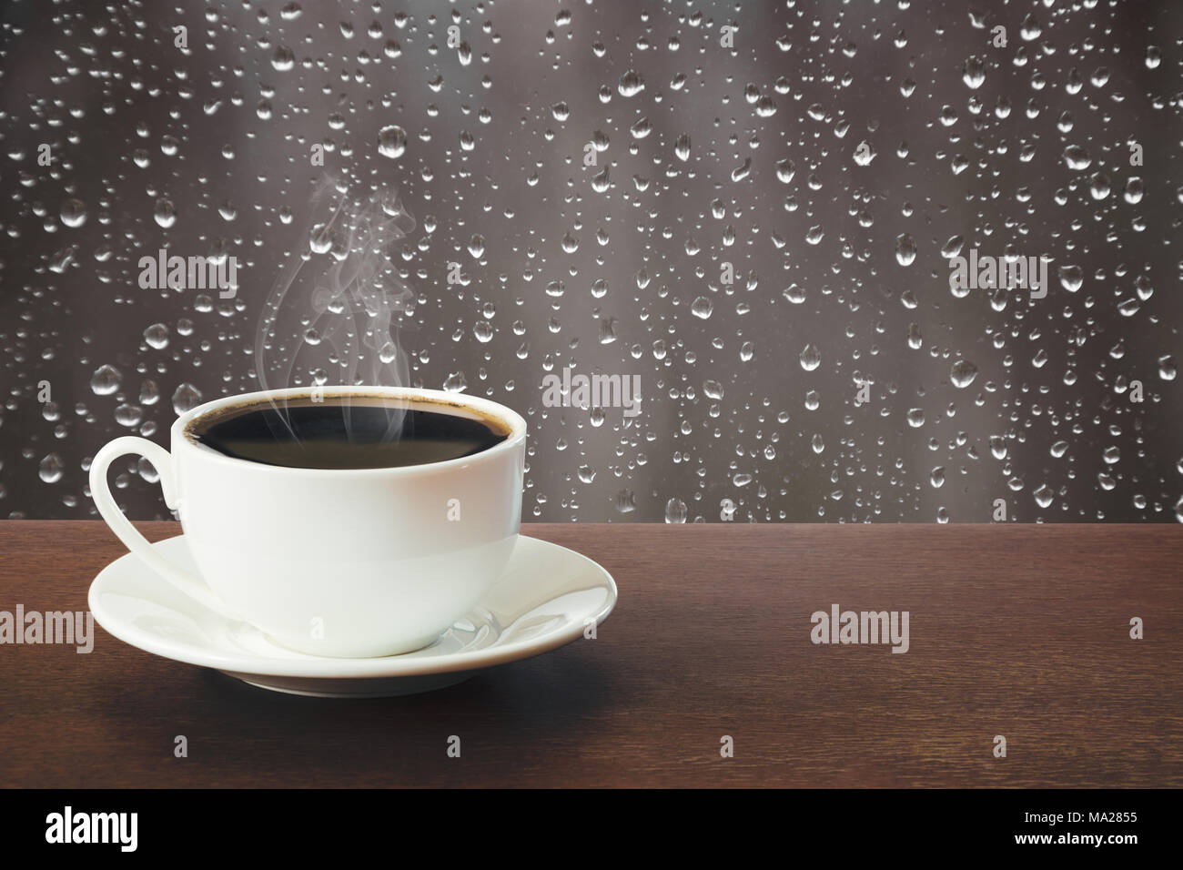 Hot Cup Of Black Coffee In A Rainy Day On Tabletop Close Up Stock Photo Alamy