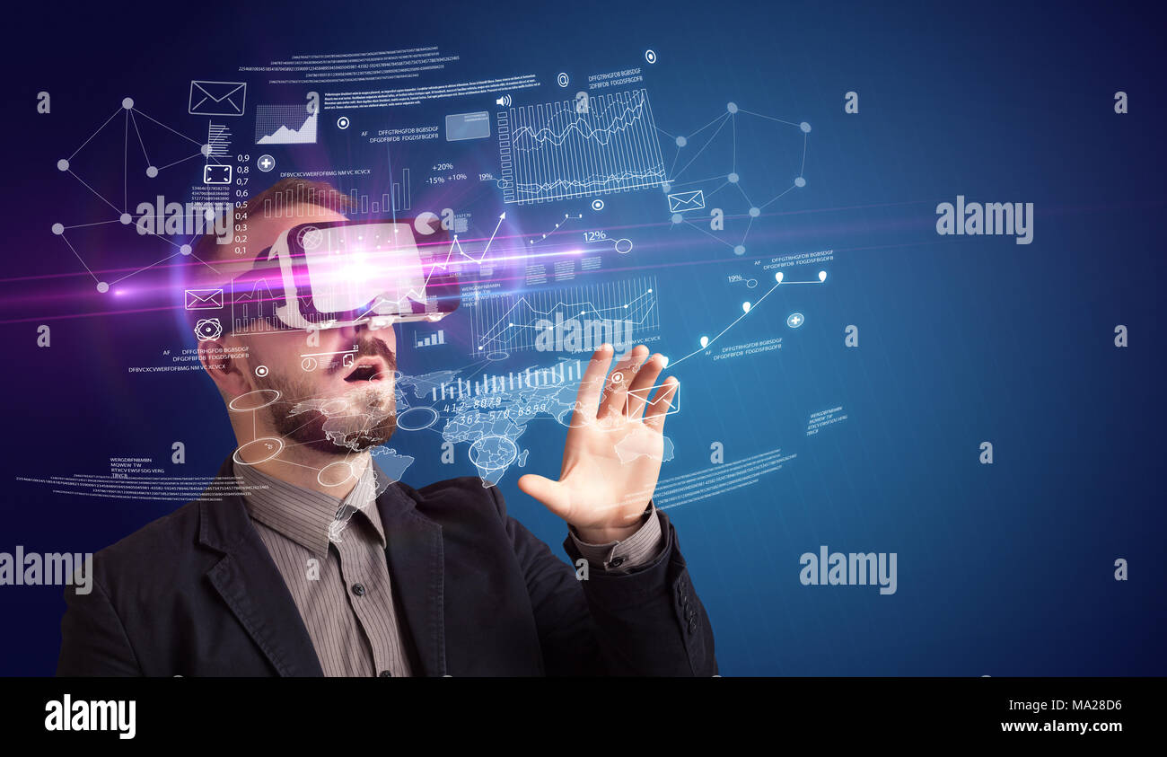 Amazed businessman with virtual reality business plan in front of him
