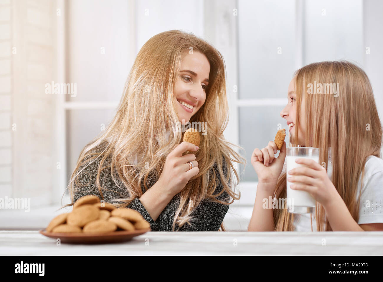 Photo Of Two Laughing Sisters Younger And Oder Both Girls Have