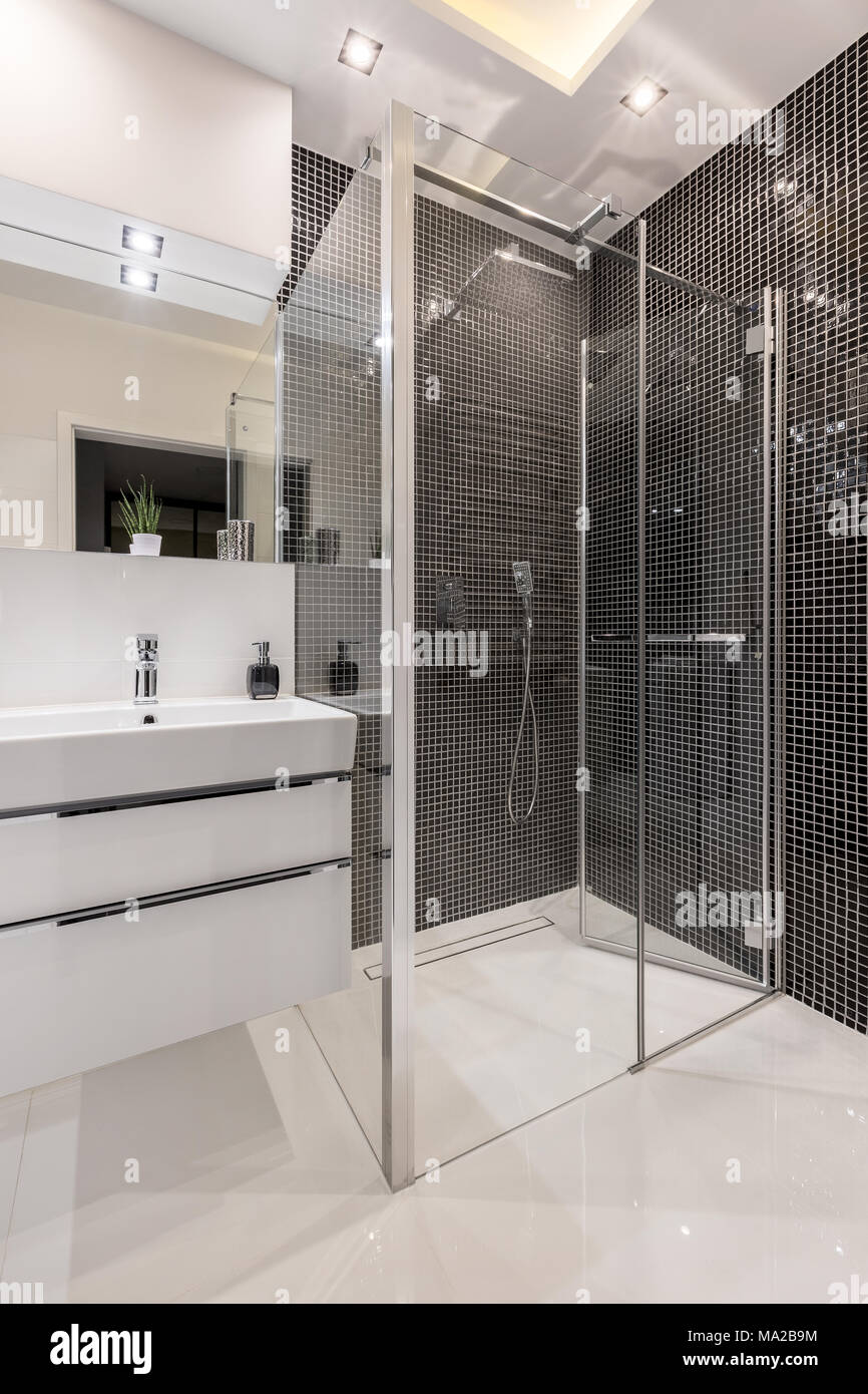 Bathroom With Walk In Shower Black Mosaic Tiles And Cabinet Basin