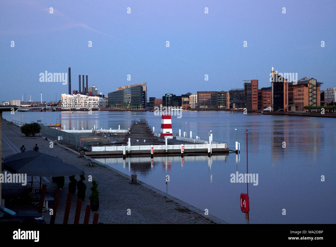 View of jetties with cityscape at Islands Brygge, Copenhagen, Denmark ...