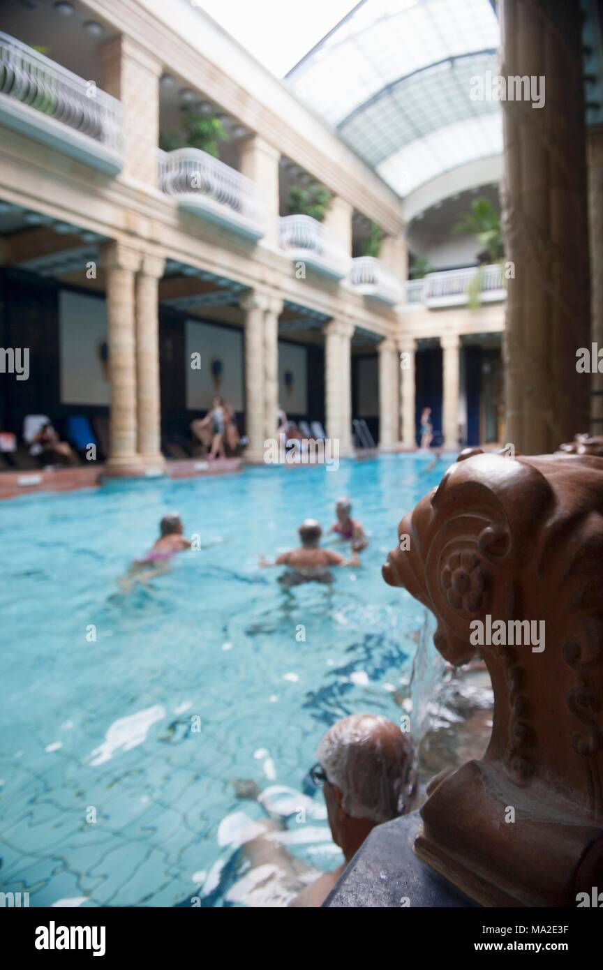 The swimming pool in the main hall of the art nouveau Gellért Baths with its glazed roof, Budapest, Hungary Stock Photo